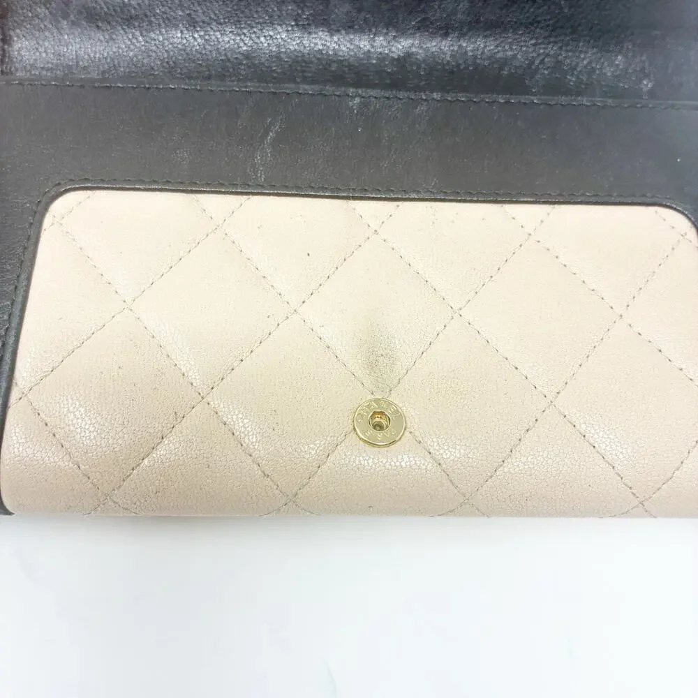 Chanel Mademoiselle Quilted Wallet in Black and Beige